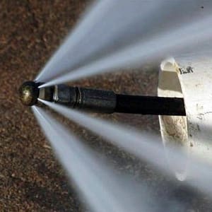 drain cleaning clogged drains with a hydro jet